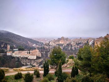 Scenic view of residential district against sky