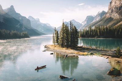 View of calm lake against mountain range