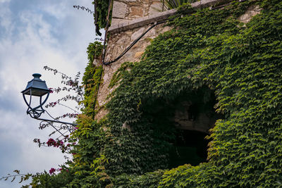 Low angle view of built structures against sky