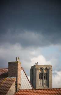 Low angle view of buildings against sky