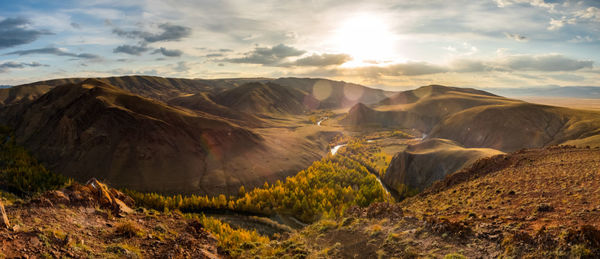 Scenic view of mountains against sky during sunset