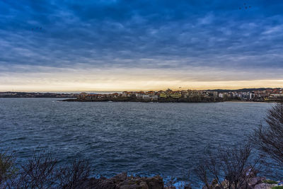 Scenic view of sea against sky during sunset