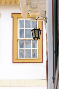 Old lanter with colonial style window behind