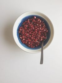 High angle view of strawberries in bowl on table