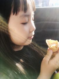 Close-up of woman eating ice cream