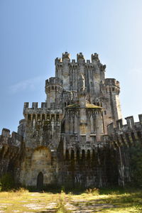 Low angle view of historic building against sky