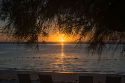 Scenic view of sunset over lake