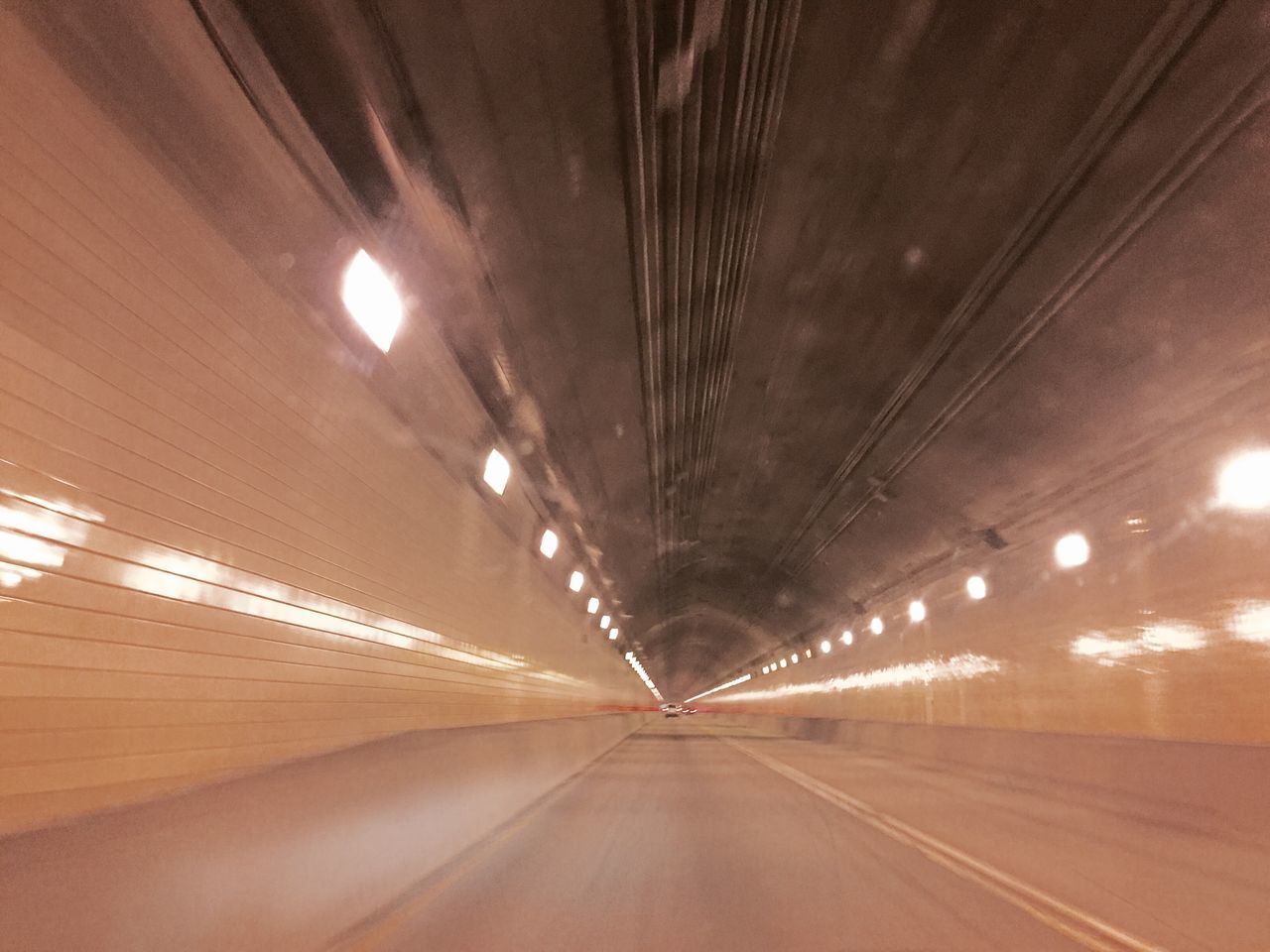 the way forward, diminishing perspective, illuminated, tunnel, vanishing point, indoors, transportation, road, lighting equipment, night, empty, architecture, built structure, ceiling, long, road marking, no people, light - natural phenomenon, empty road, electric light