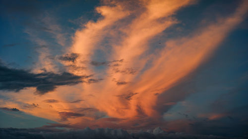 Low angle view of dramatic sky during sunset