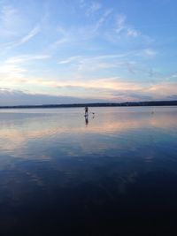 Reflection of clouds in calm lake