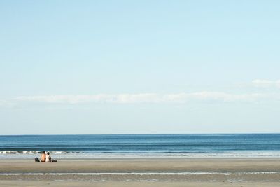 View of calm beach against the sky