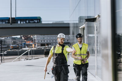 People talking at construction site