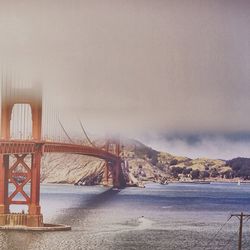 View of suspension bridge over river