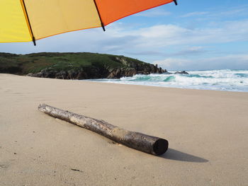 Scenic view of beach against sky