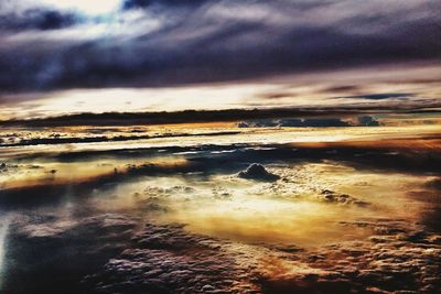 Scenic view of sea against cloudy sky