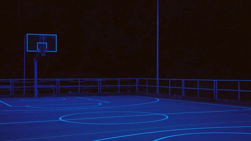 View of basketball hoop at night