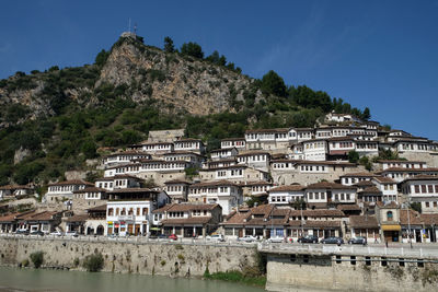 Traditional ottoman houses in old town berat known as the white city of albania