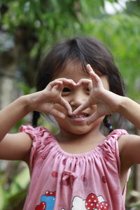 Close-up of girl playing in park