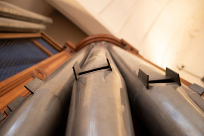 Low angle view of organ pipes close up