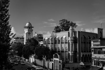 Panoramic view of buildings in city against sky