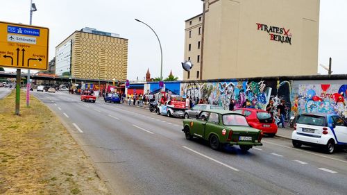 People on road in city