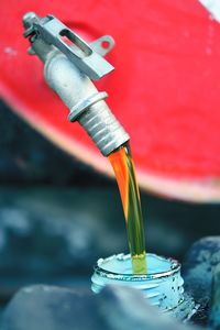 Close-up of red wine bottle on table