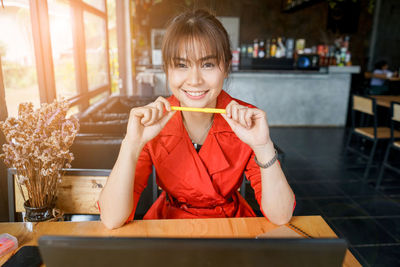 Portrait of a smiling young woman