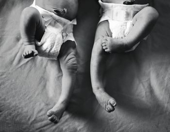 High angle view of mother and daughter at home