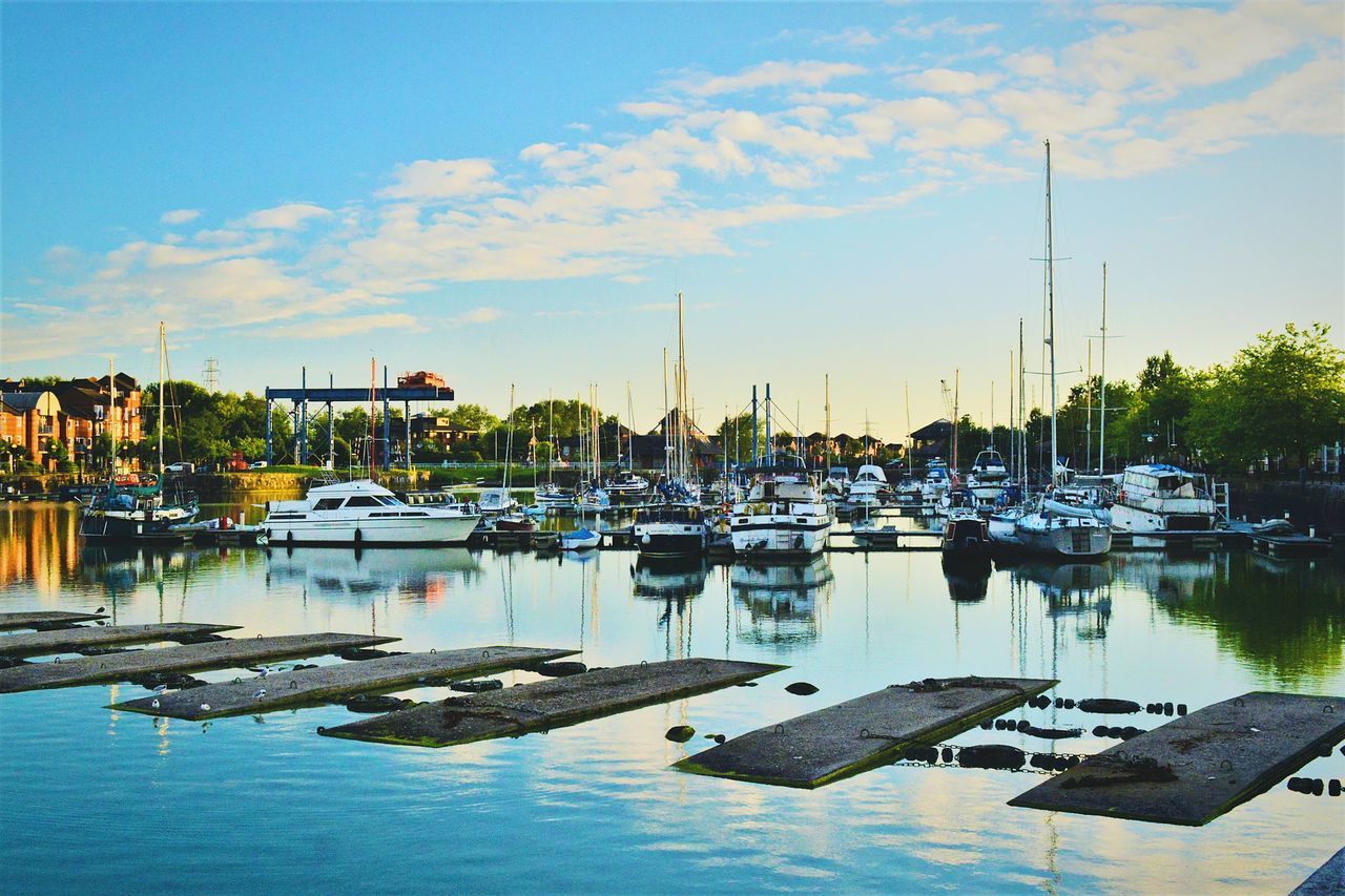 VIEW OF BOATS MOORED AT HARBOR