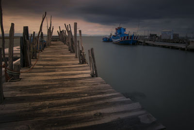 Pier over sea against sky