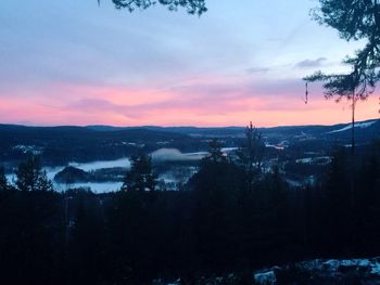 Scenic view of landscape against sky during sunset