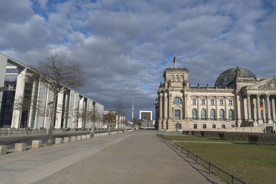 View of berlin landmarks, the bundestag and berliner fernsehturm surrounded by empty streets