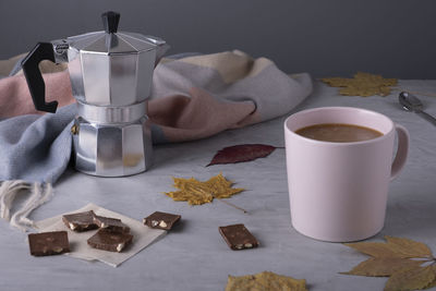 High angle view of coffee cup on table