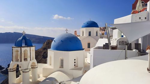 Panoramic view of white building against blue sky