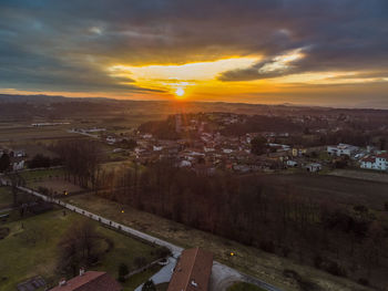 High angle view of cityscape against sky during sunset