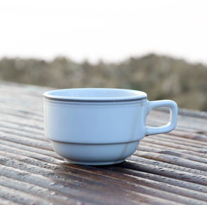 Close-up of coffee cup on table