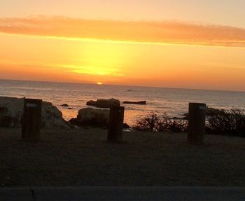 Scenic view of sea at sunset