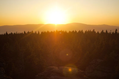 Scenic view of mountains against sky during sunset