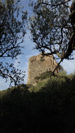 Low angle view of old building against sky