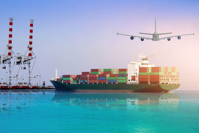 Ship in sea against clear sky