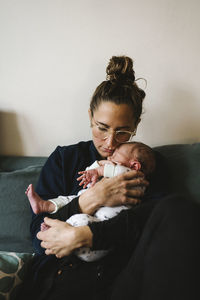 Mother holding newborn baby