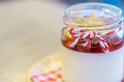 Close-up of glass of jar on table