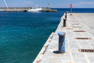 Rear view of man looking at harbor
