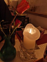 Close-up of illuminated lighting equipment on table