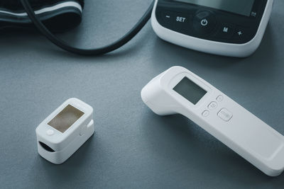 High angle view of smart phone on table