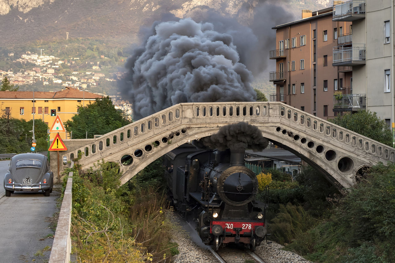 TRAIN ON RAILROAD TRACKS