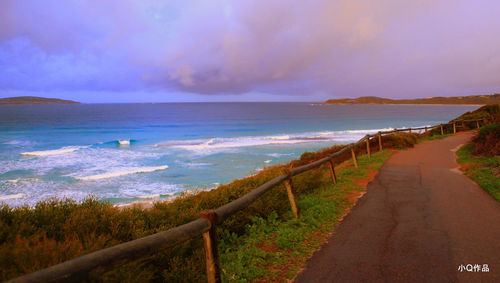 Scenic view of sea against cloudy sky