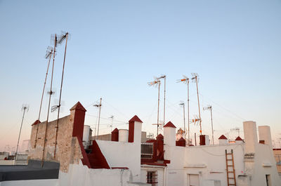 Low angle view of buildings against clear sky