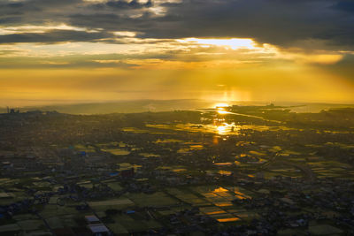 High angle view of townscape against sky during sunset