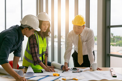 Business colleagues working at office